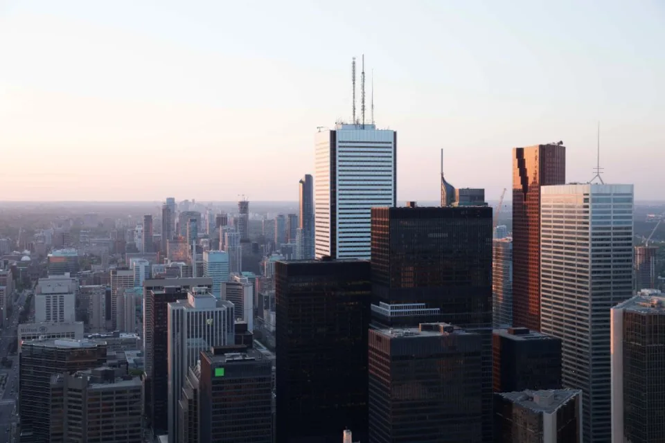 office buildings and towers photographed against an open sky