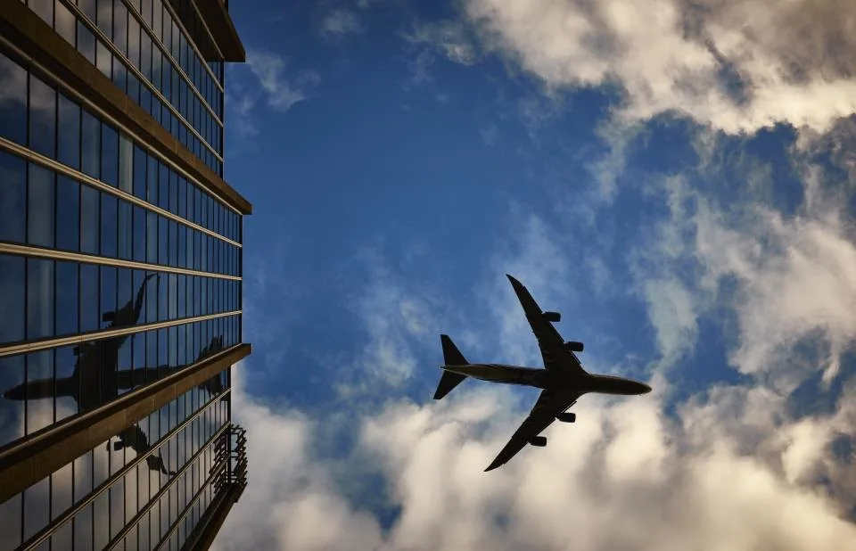 office buildings and towers photographed against an open sky