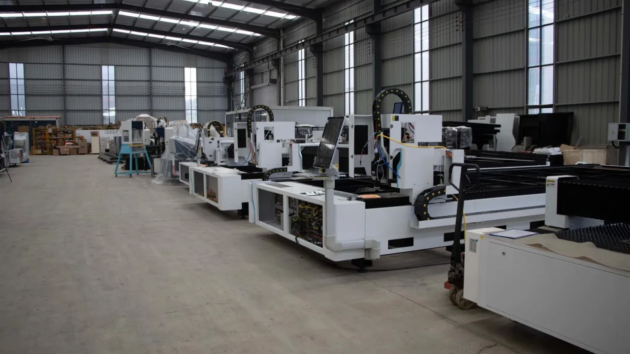 Production line of industrial manufacturing machines in a factory hall.