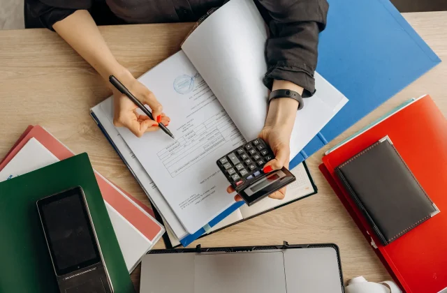 An adviser going through financial documents with a client.